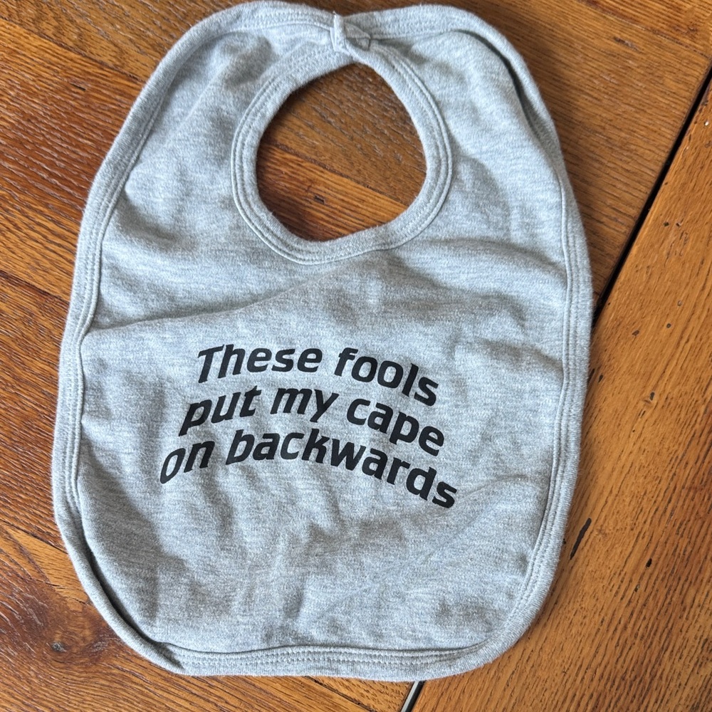 Playful Gray Baby Bib with Fun Message